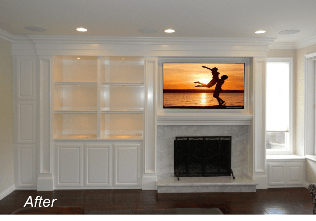 A living room with a fireplace and built in bookcases.