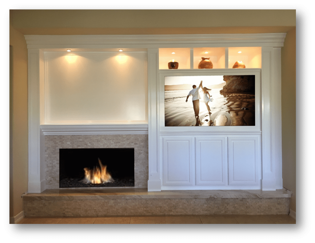 A fireplace with a tv above it and a fire place.