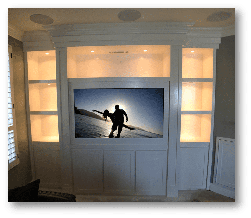 A large flat screen tv mounted to the wall.