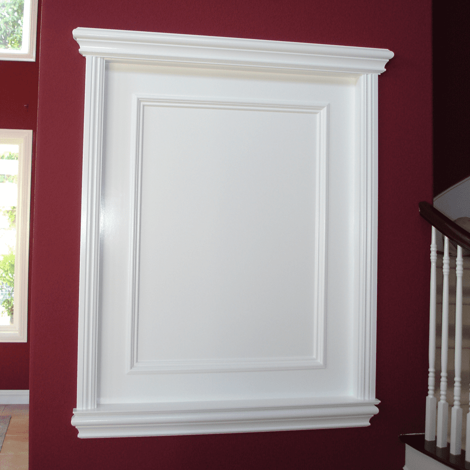 A white cabinet in the middle of a red wall.