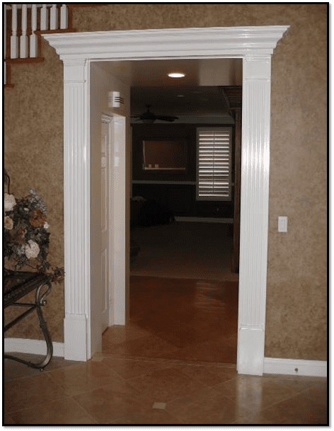 A doorway leading to the living room of a house.