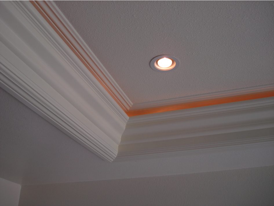 A ceiling with lights and a white wall