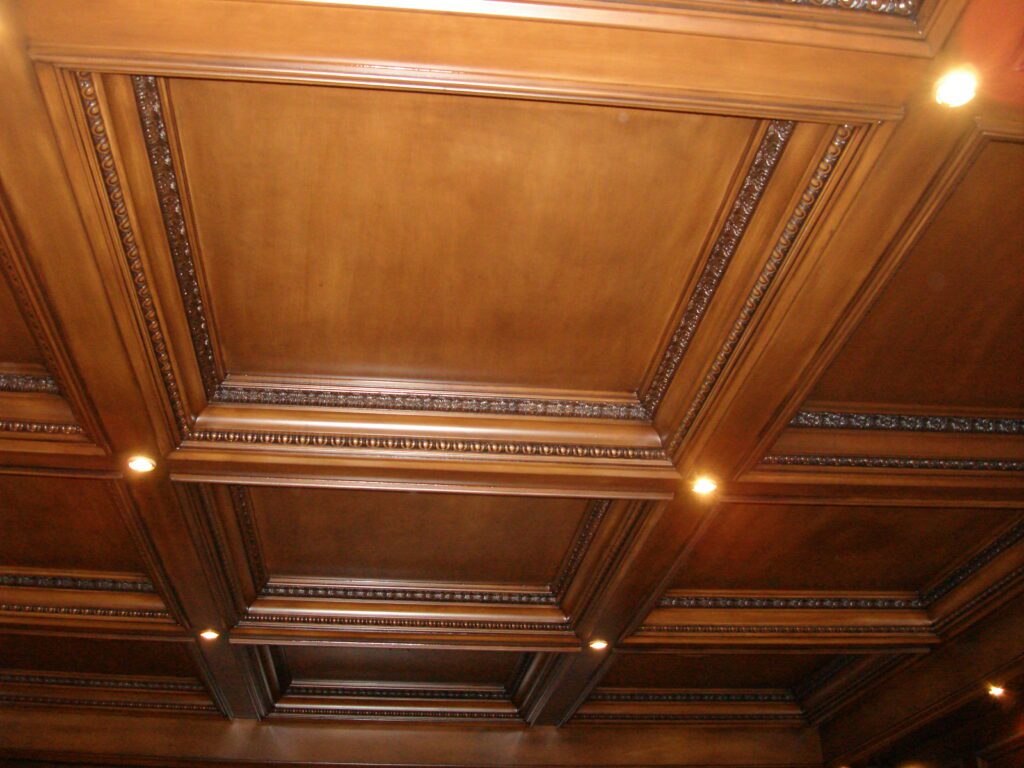 A wooden ceiling with lights on it