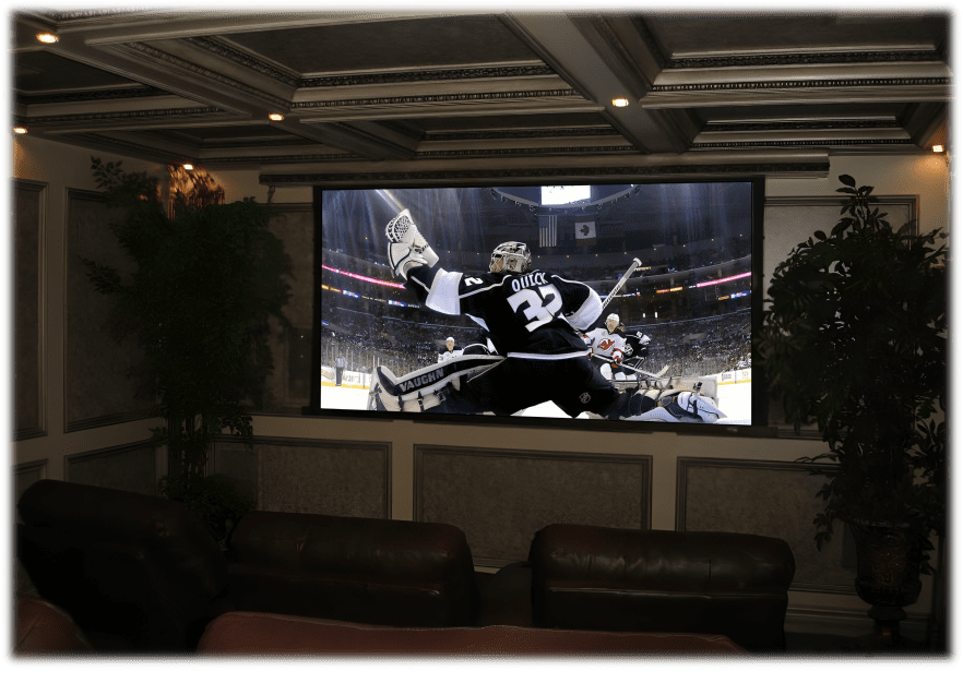 Home theater displaying ice hockey game.