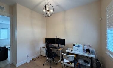 Room before custom dual-workstation home office installation in Star, Idaho