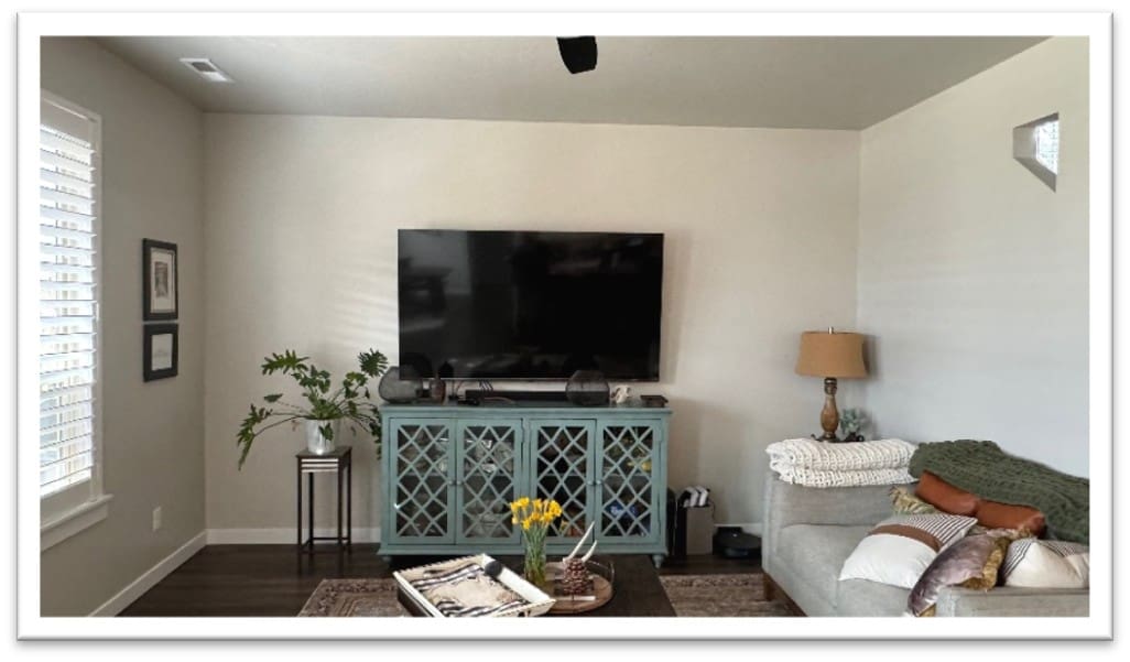 Living room before custom electric fireplace entertainment center installation in Star, Idaho